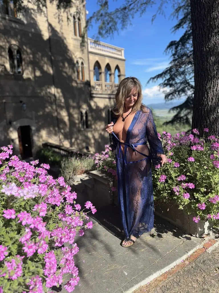 foxykelly in blue sheer robe looking down wards